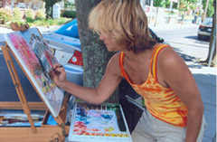Marie Natale painting on location